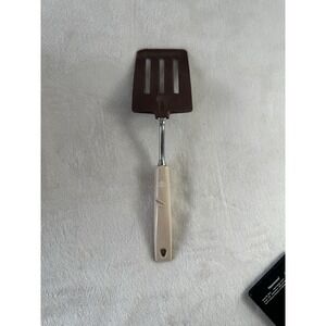 Vintage EKCO Brown Slotted Turner /w Beige Plastic Handle USA